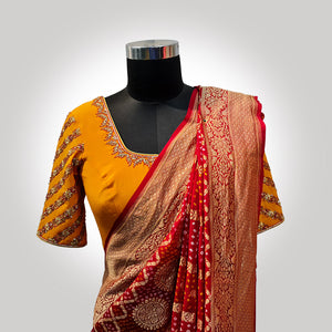 Yellow Crepe Blouse with Pitta Work